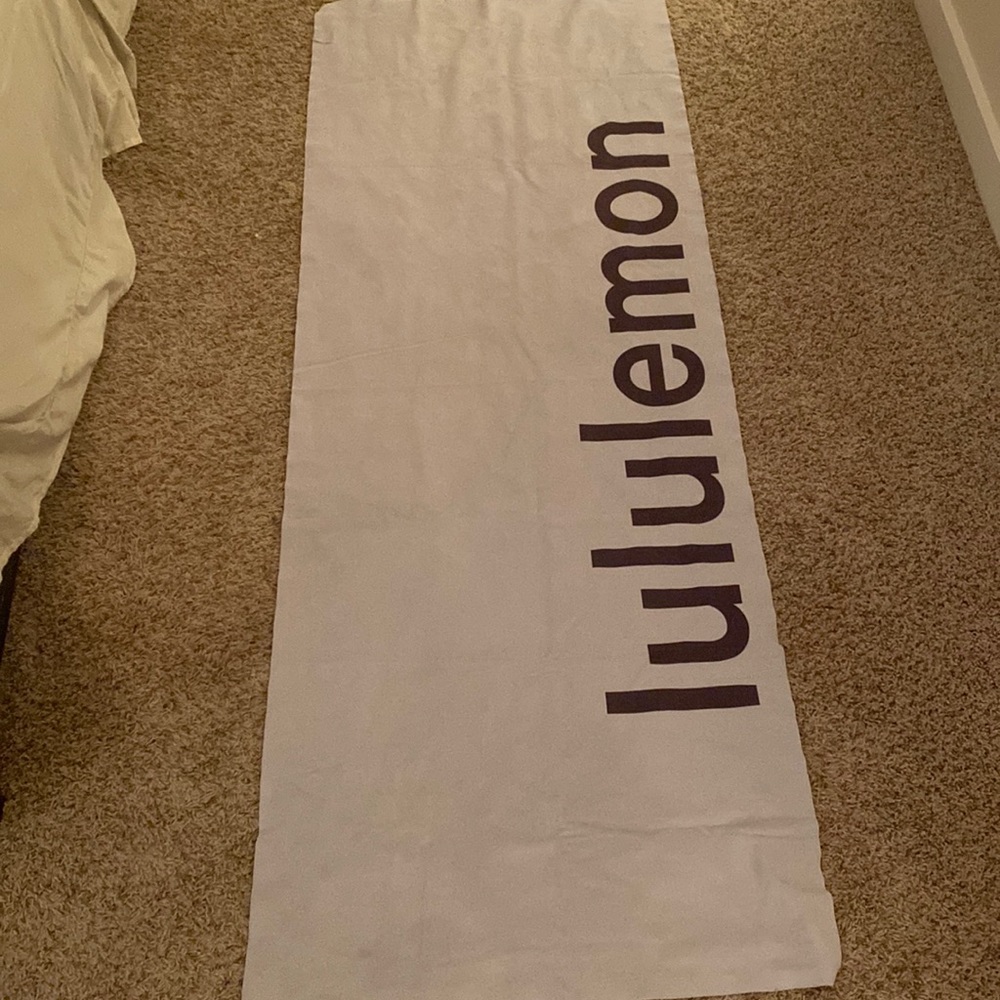 The Towel logo purple